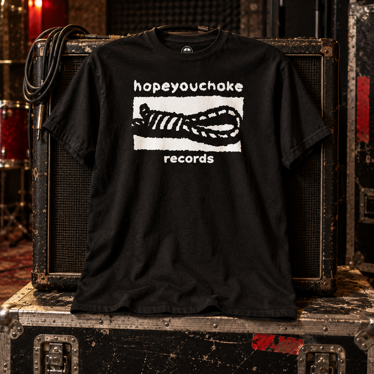 Black HOPEYOUCHOKE Records tee displayed in a gritty studio